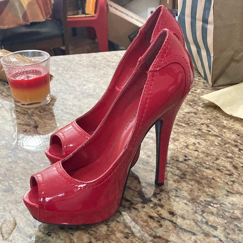 Open toe red heels